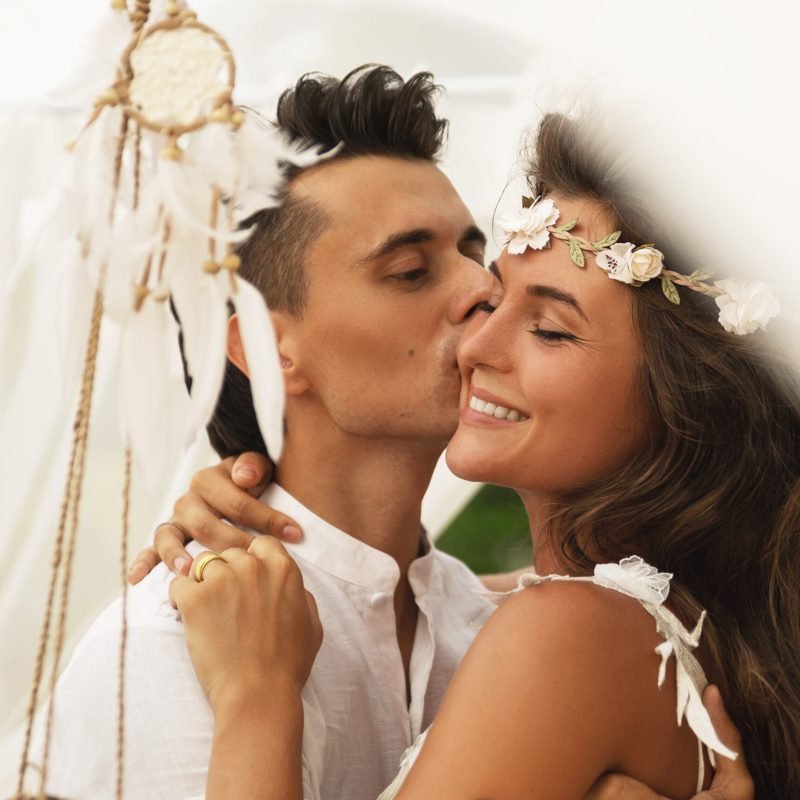 Happy married couple is celebrating their wedding Beautiful and happy married couple is celebrating their wedding